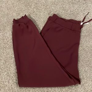 Lululemon On The Fly Jogger. Color: maroon Size: 12